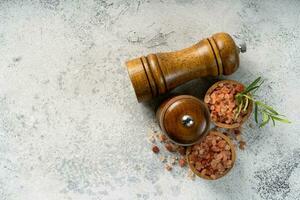 Himalayan pink salt is herb seasoning isolated on white abstract background with copy space photo