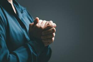 Christian life crisis prayer to god. Woman Pray for god blessing to wishing have a better life. woman hands praying to god with the bible. begging for forgiveness and believe in goodness. photo