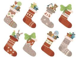 Christmas socks. Xmas stocking or sock with snowflakes, snowman and Santa. Deer and Santas helpers elves on stockings vector set