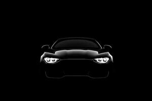 Front view dark silhouette of a modern luxury black car isolated on black background. photo