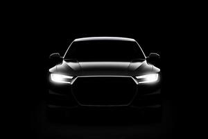 Front view dark silhouette of a modern luxury black car isolated on black background. photo