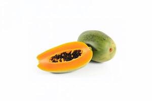 Fresh whole and sliced papaya fruits isolated on white background. photo