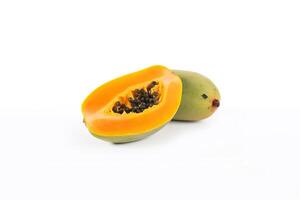 Fresh whole and sliced papaya fruits isolated on white background. photo