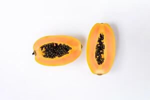 Top view fresh sliced papaya fruits isolated on white background. photo