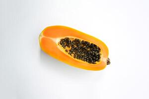 Top view fresh sliced papaya fruit isolated on white background. photo