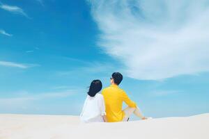 a couple sitting on a beach. sweet couple happy relax enjoy love and romantic moment. photo