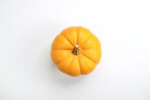 Top view of fresh orange pumpkin isolated on white background. photo