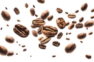 Falling roasted coffee beans isolated on white background with selective focus. photo