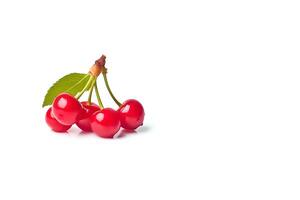 Delicious ripe sweet cherries on white background with copy space. photo