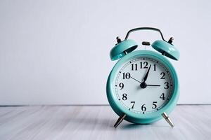 blue alarm clock on a white background. photo