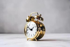 golden alarm clock. photo