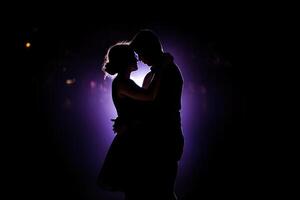 Silhouette of a romantic couple dancing and enjoying in the dark. AI Generated photo