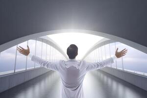 Successful businessman raising hand and expressing positivity while standing over the bridge. photo