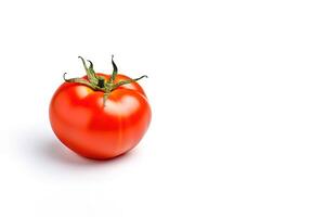 Fresh whole red tomato isolated on white background with copy space. photo