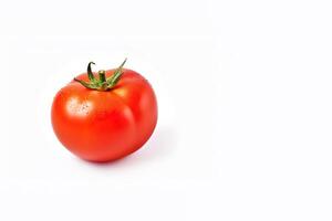 Fresh whole red tomato isolated on white background with copy space. photo