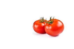 Fresh whole red tomatoes isolated on white background with copy space. photo