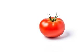 Fresh whole red tomato isolated on white background with copy space. photo