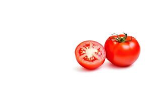 Fresh whole and sliced red tomatoes isolated on white background with copy space. photo