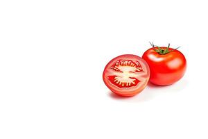 Fresh whole and sliced red tomatoes isolated on white background with copy space. photo