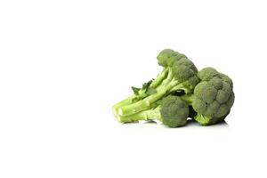 Fresh broccolis isolated on white background with copy space. photo