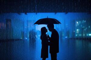 Silhouette a couple standing under an umbrella in the rain. photo