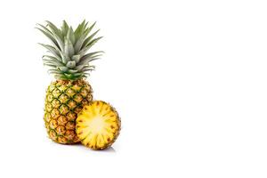 Fresh ripe whole and sliced pineapples isolated on white background with copy space. photo
