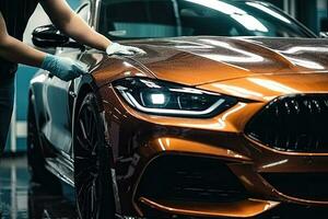 Close up of a auto body mechanic buffing a scratch on sports car photo