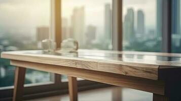Wood table top on blur glass window wall building background photo