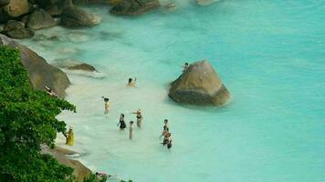 Chinese tourists swimming at the beach near Koh Miang island, Thailand video