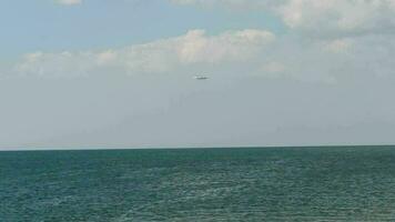 Widebody airplane approaching before landing at Phuket International airport, slow motion. video