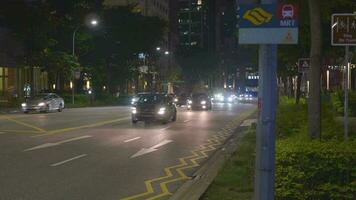 Singapore marina bay 1 june 2022. city traffic and financial buildings at night video