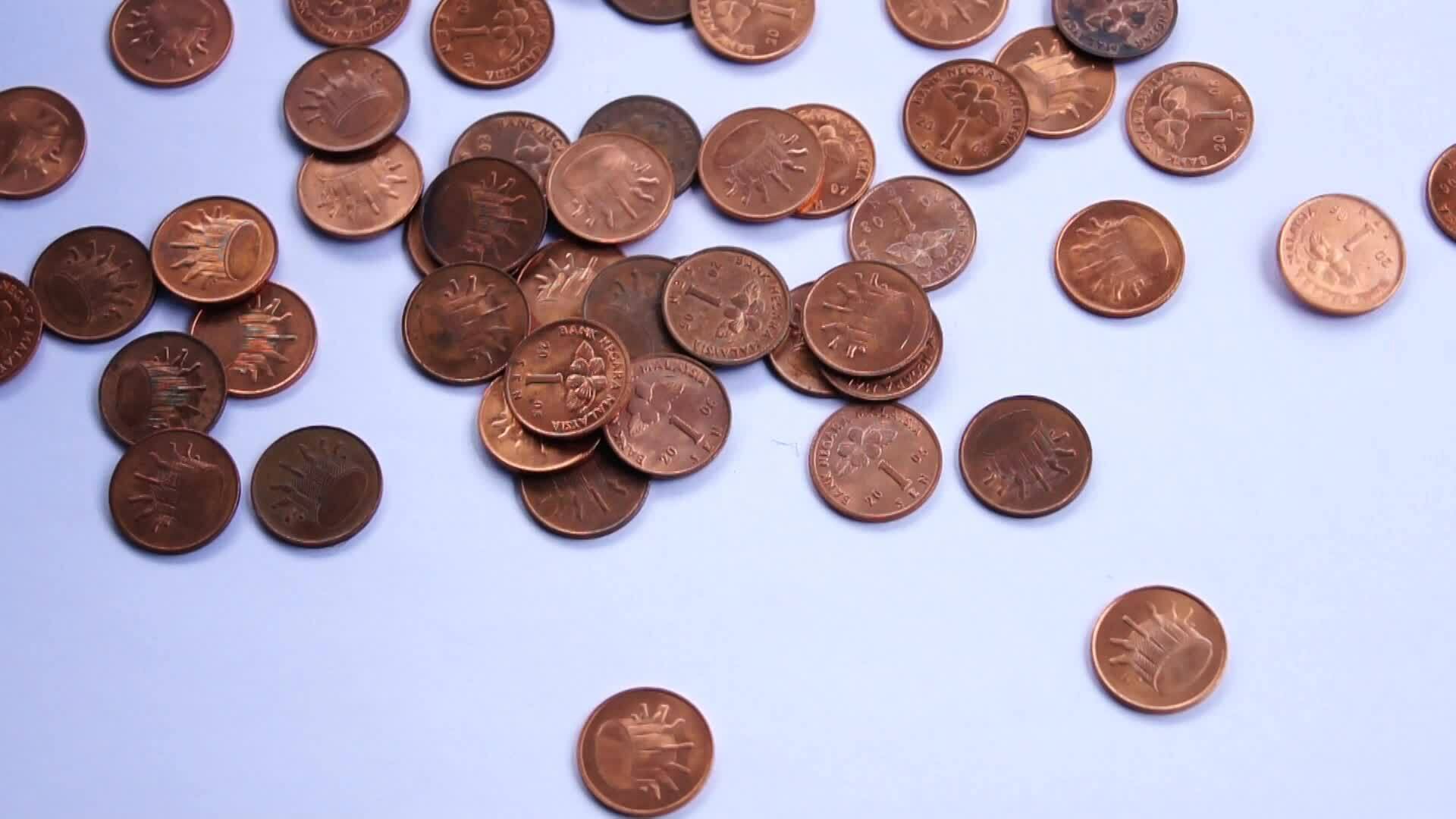 coins-dropping-to-floor-1-cent-money-metal-23981681-stock-video-at