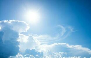 Beautiful blue clear sky with white cloud and sunshine background. photo