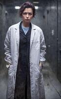 scientist researcher wearing ripped lab coat at laboratory, photo