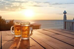 pint on a wooden table in the golden light of a summer sunset with photo