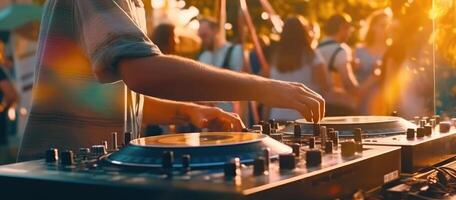 Dj playing music on a turntable in front of a crowd at festival, closeup photo. photo