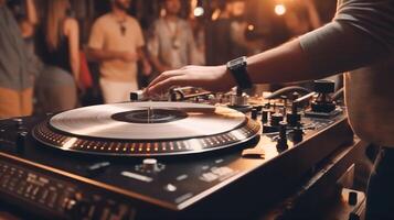 Dj playing music on a turntable in front of a crowd at festival, closeup photo. photo