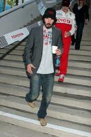 Keanu Reeves arriving back after lunch at the Toyota ProCeleb Qualifying Day on April 17 2009 at the Long Beach Grand Prix course in Long Beach California 2009 Kathy Hutchins Hutchins Photo