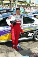 Mary Lynn Rajskub with her car at the Toyota ProCeleb Qualifying Day on April 17 2009 at the Long Beach Grand Prix course in Long Beach California 2009 Kathy Hutchins Hutchins Photo