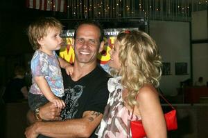 Lloyd Eisler  Kristy Swanson with their son Magnus arriving at the premiere of Fly Me To The Moon at the Directors Guild Theater in Los Angeles CA August 3 2008 2008 Kathy Hutchins Hutchins Photo