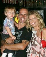 Lloyd Eisler  Kristy Swanson with their son Magnus arriving at the premiere of Fly Me To The Moon at the Directors Guild Theater in Los Angeles CA August 3 2008 2008 Kathy Hutchins Hutchins Photo