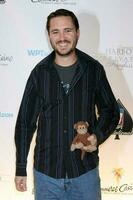 Wil Wheaton carrying the Curious George that his son gave to him for good luck WPT Celebrity Invitational 2008 Commerce Casino Commerce CA March 1 2008 2008 Kathy Hutchins Hutchins Photo