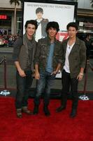 Jonas Brothers    arriving at the 17 Again Premiere at Graumans Chinese Theater in Los Angeles CA on April 14 20092009 photo