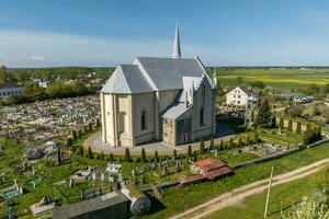 aerial view on baroque or gothic temple or catholic church in countryside photo