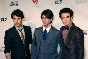 Jonas Brothers arriving at Music Cares Man of the Year Dinner honoring Neil Diamond at the Los Angeles Convention Center in Los Angeles CA on February 6 2009 2009 Kathy Hutchins Hutchins Photo