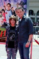 Johnny Bennett  Jon Cryer arriving at the Shorts Premiere at Gaumans Chinese Theater in Hollywood CA on August 15 2009 2009 Kathy Hutchins Hutchins Photo