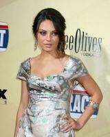 Mila Kunis arriving at the Extract Premiere at the ArcLight Theater in Los Angeles CA on August 24 2009 2009 Kathy Hutchins Hutchins Photo