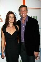 Laura Leighton  Doug Savant arriving at Melrose Place Premiere Party on Melrose Place in Los Angeles CA on August 22 2009 2009 Kathy Hutchins Hutchins Photo