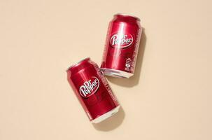 Mykolaiv, Ukraine May 6, 2023 Metal can of Dr. Pepper drink on a beige background, top view photo