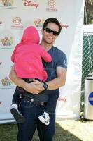 Mark Wahlberg and son Michael arriving at the A Time For Heroes Celebrity Carnival benefiting the Elizabeth Glaser Pediatrics AIDS Foundation at the Wadsworth Theater Grounds in Westwood , CA on June 7, 2009 photo